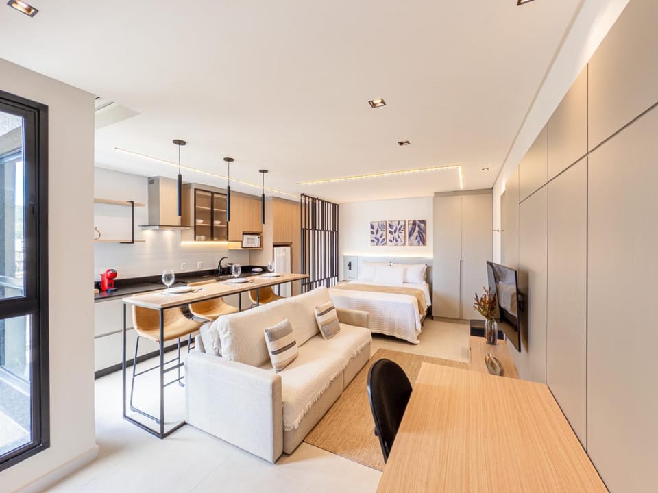 TV and multimedia, Kitchen or kitchenette, Living room, Photo of the whole room, Seating area, Dining area