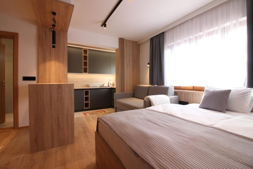 Kitchen or kitchenette, Seating area, Bedroom