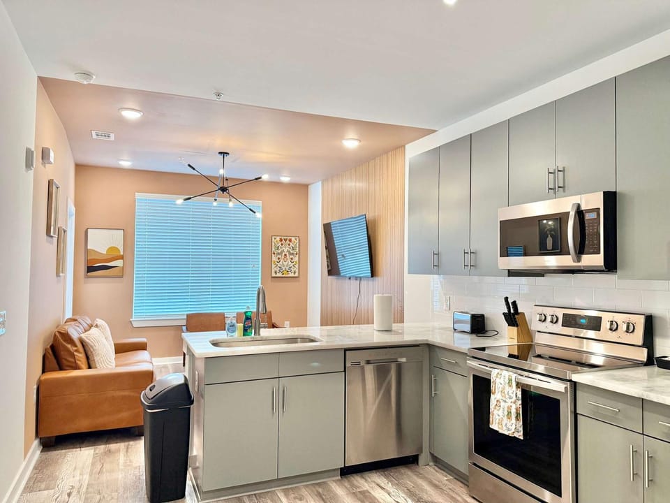 Kitchen or kitchenette, dishwasher, oven, stove, toaster