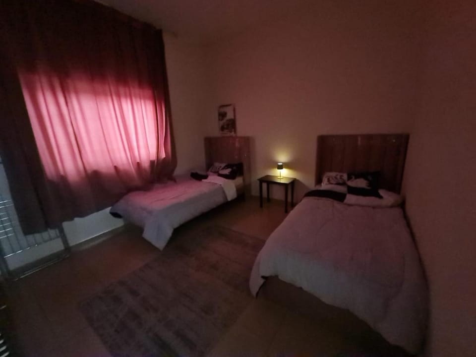 One bedroom with tow bed Apartment in Al Sharjah