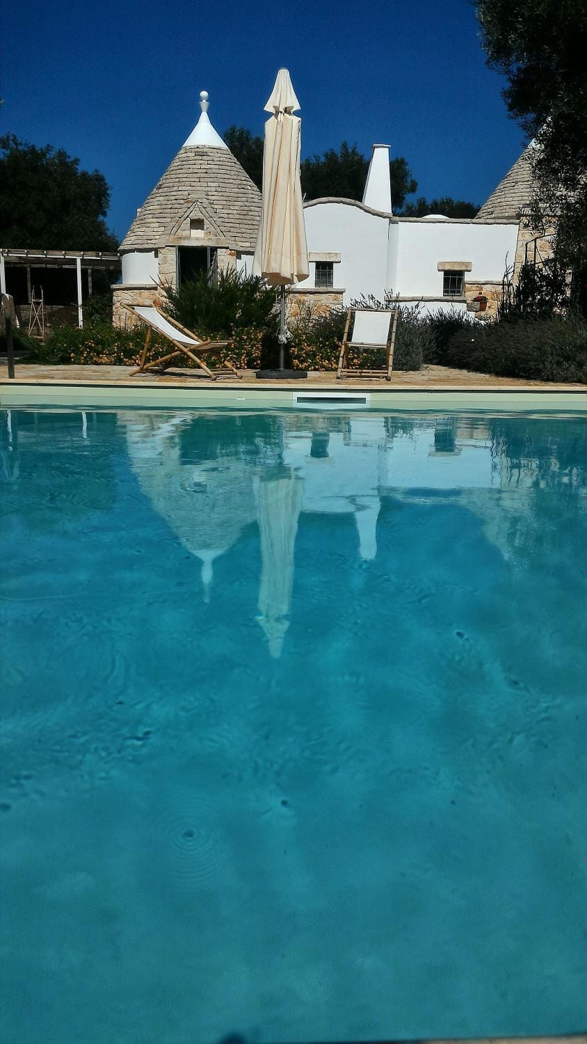 Property building, Living room, Swimming pool