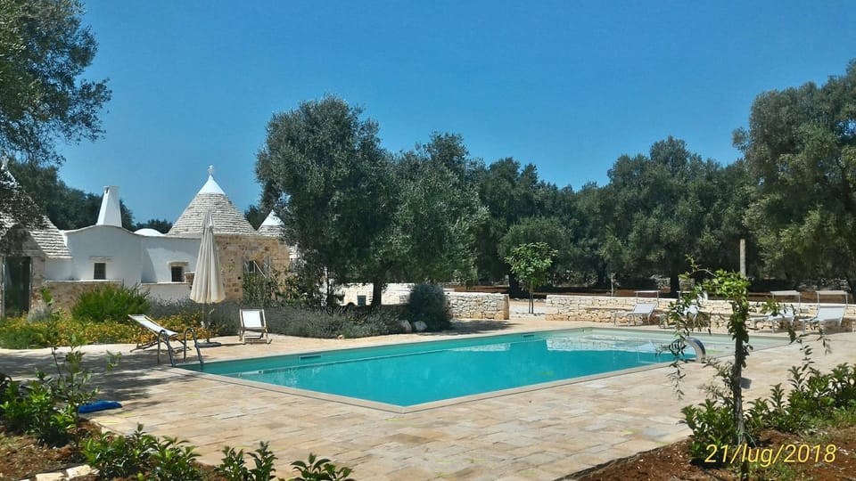 Property building, Living room, Swimming pool