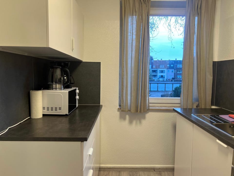 Kitchen or kitchenette, oven, stove