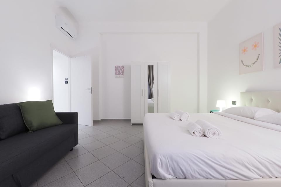 Bed, Photo of the whole room, Bedroom, towels, air conditioner