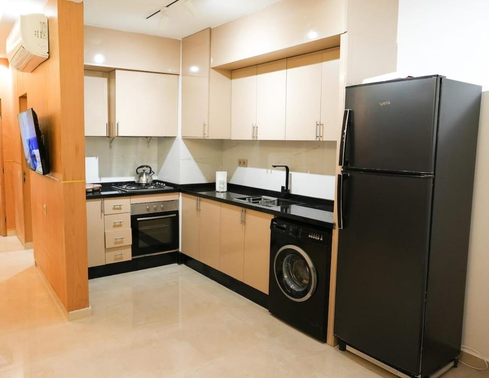 Kitchen or kitchenette, washing machine