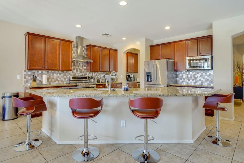 Outdoor Kitchen + Patio: Upscale Home Near Phoenix House in Laveen Village