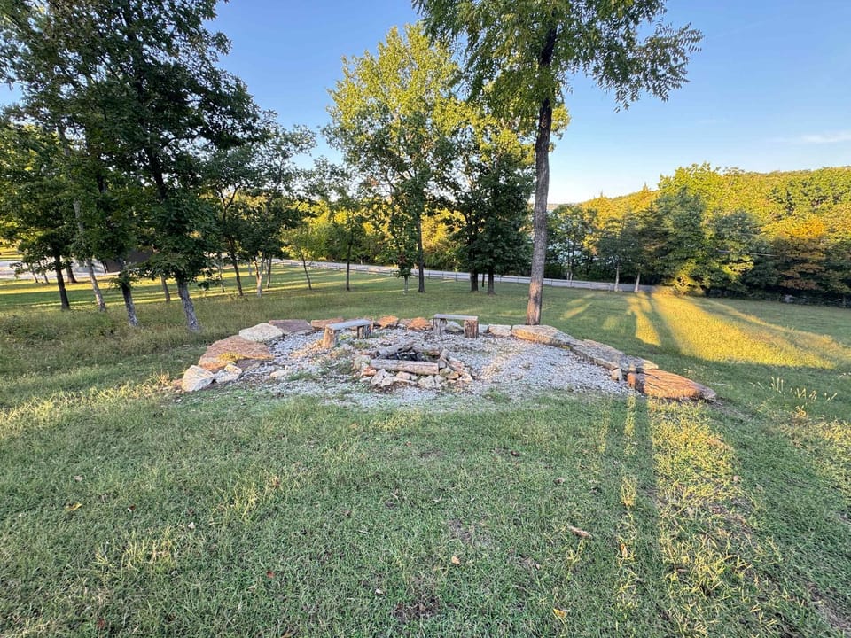 Chasing Sunsets Lakeview Escape w Fire Pit & Screened Porch House in Beaver Lake