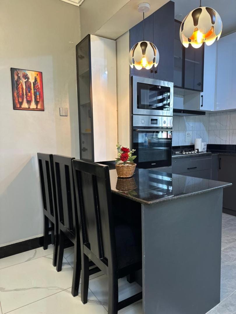 Sunset Statehouse View Residence A Apartment in Uganda