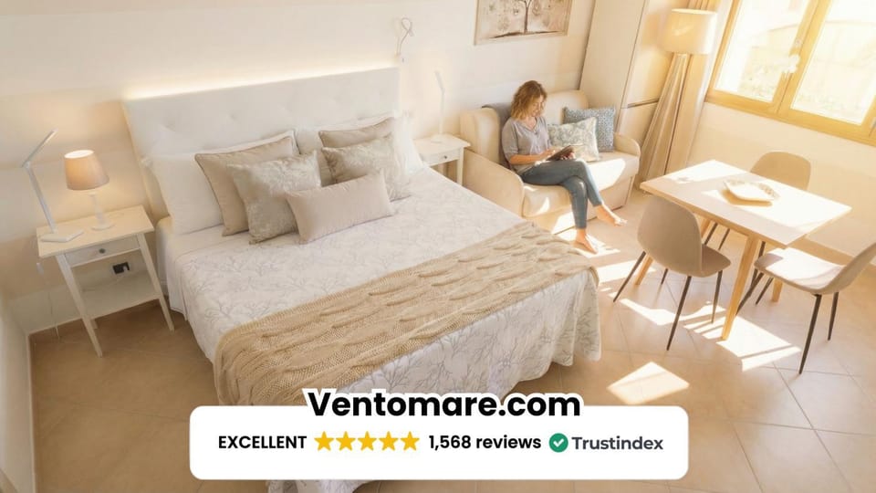 Bed, People, Property logo or sign, Photo of the whole room, Dining area, Logo/Certificate/Sign, Bedroom, Text overlay, Guests, group of guests, Certificate/Award