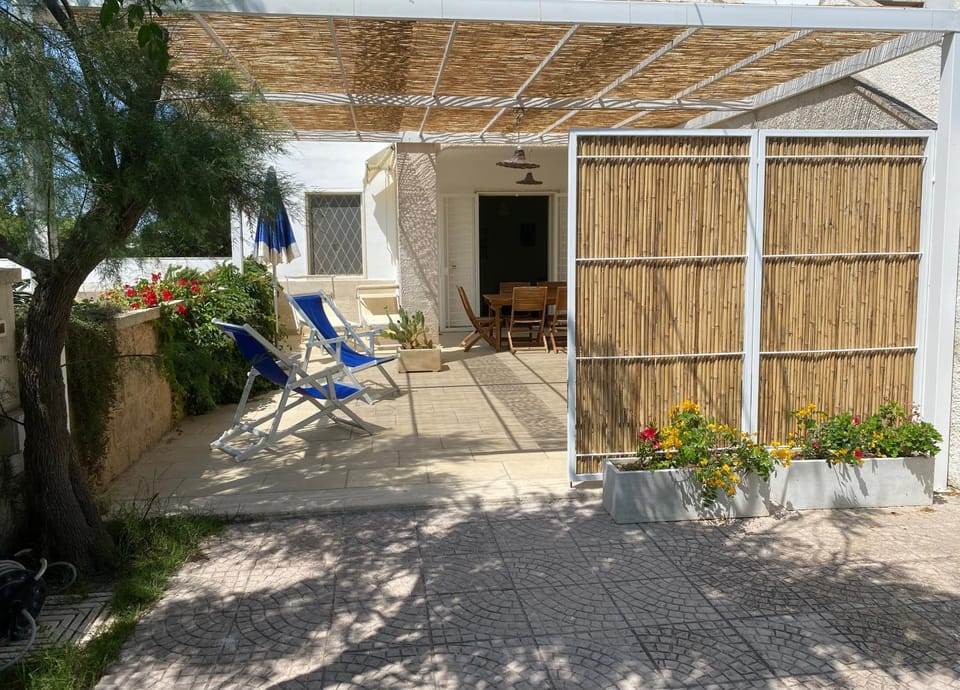 Saraceni House in Torre Lapillo