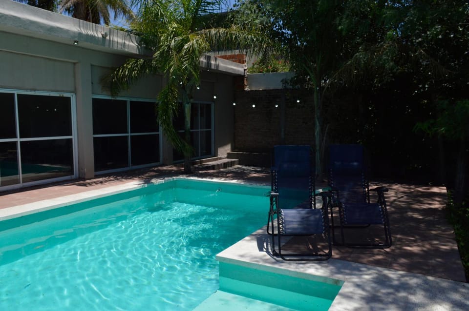 Swimming pool, sunbed