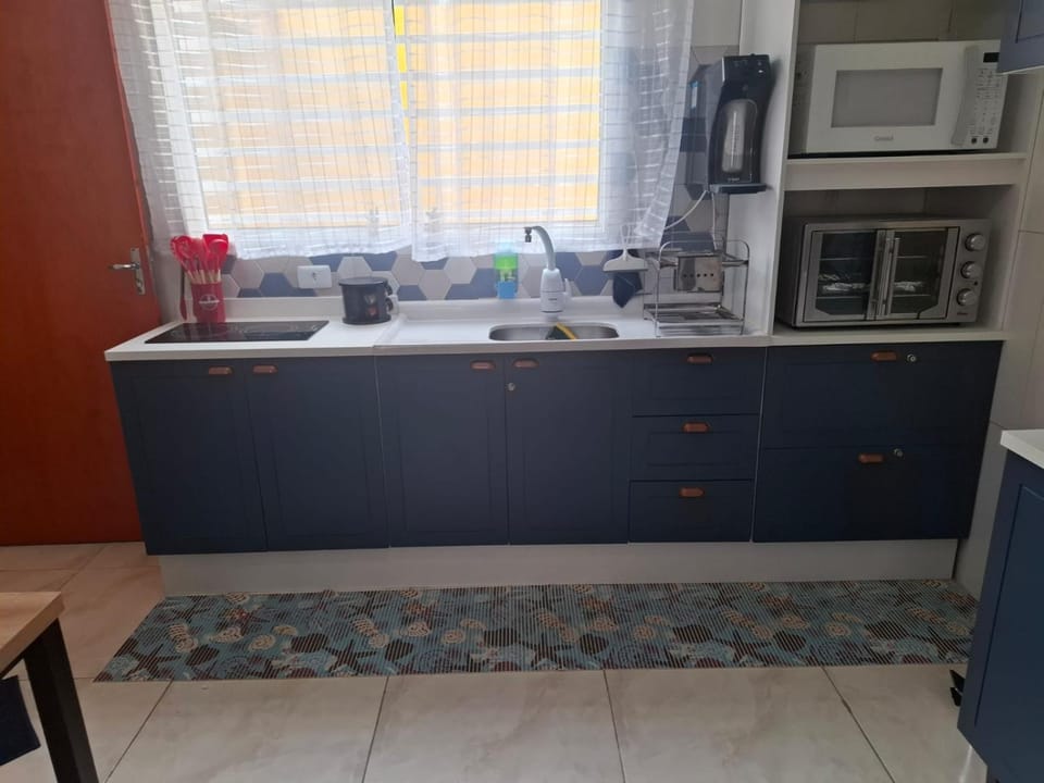 Kitchen or kitchenette, oven, stove
