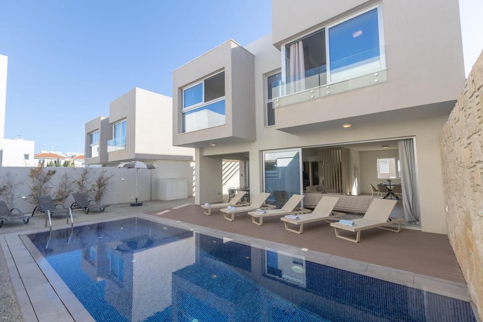 Property building, Seating area, Swimming pool, sunbed