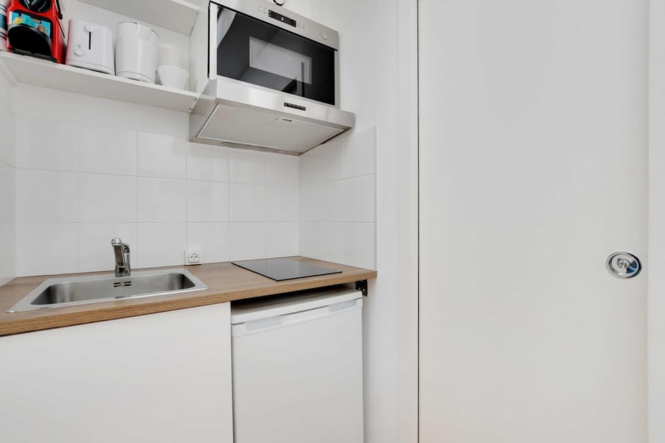 Kitchen or kitchenette, stove