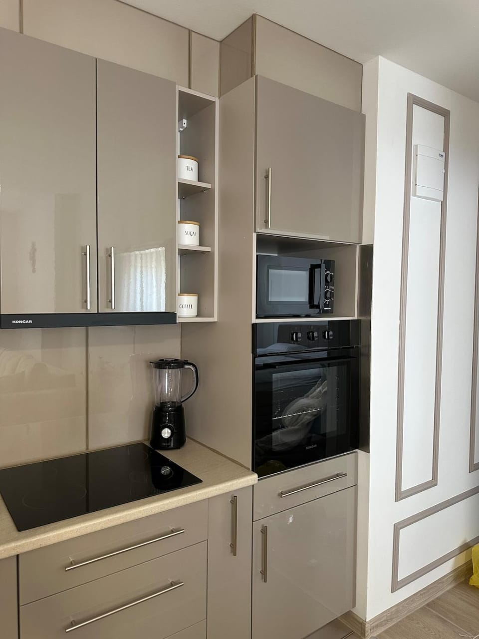 Kitchen or kitchenette, dishwasher, oven, stove, toaster