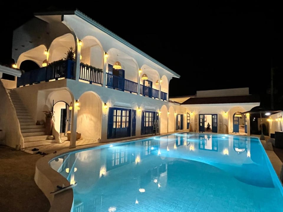 Property building, Patio, Night, View (from property/room), Swimming pool, Swimming pool