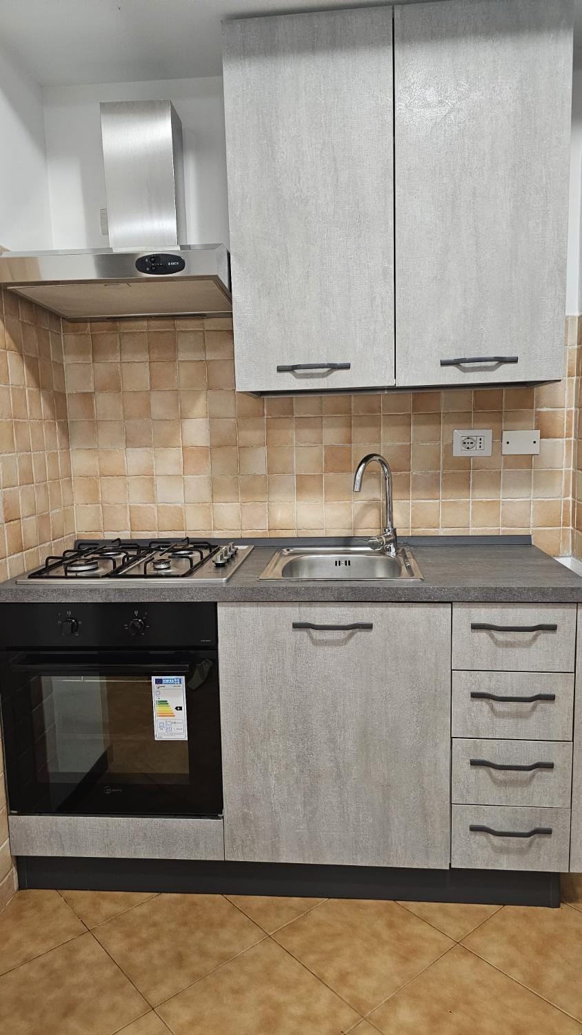 Kitchen or kitchenette, stove