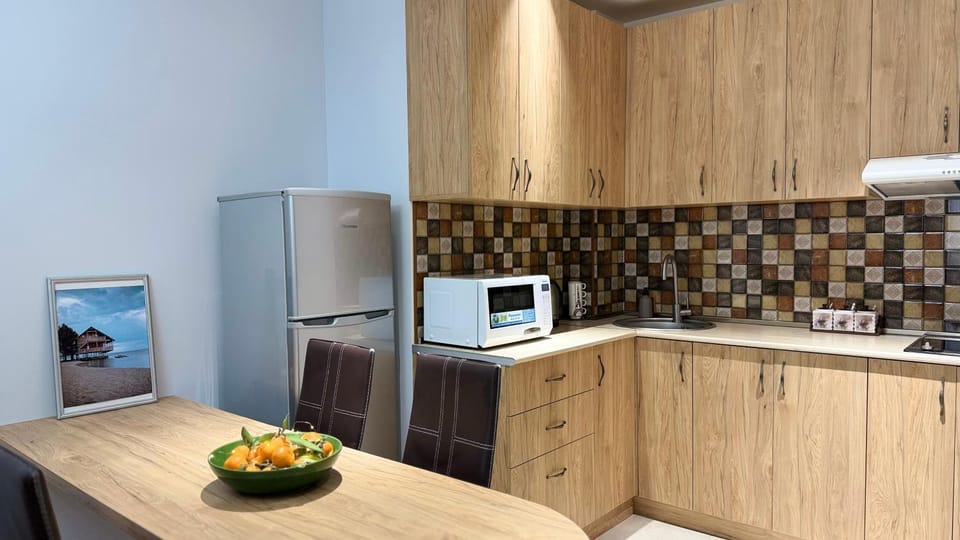 Kitchen or kitchenette, stove