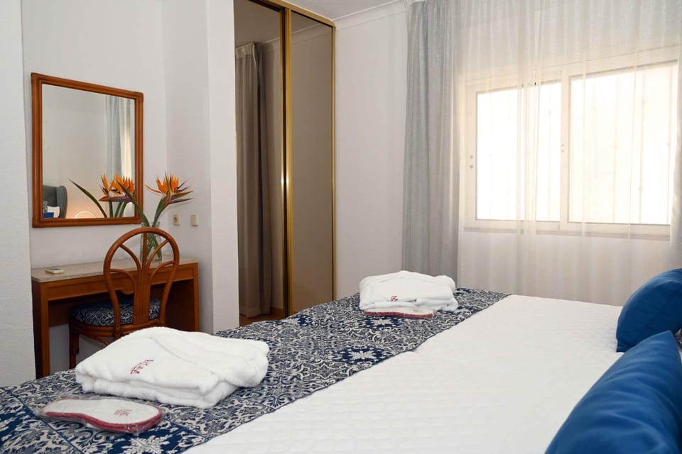Bed, Bedroom, towels, wardrobe