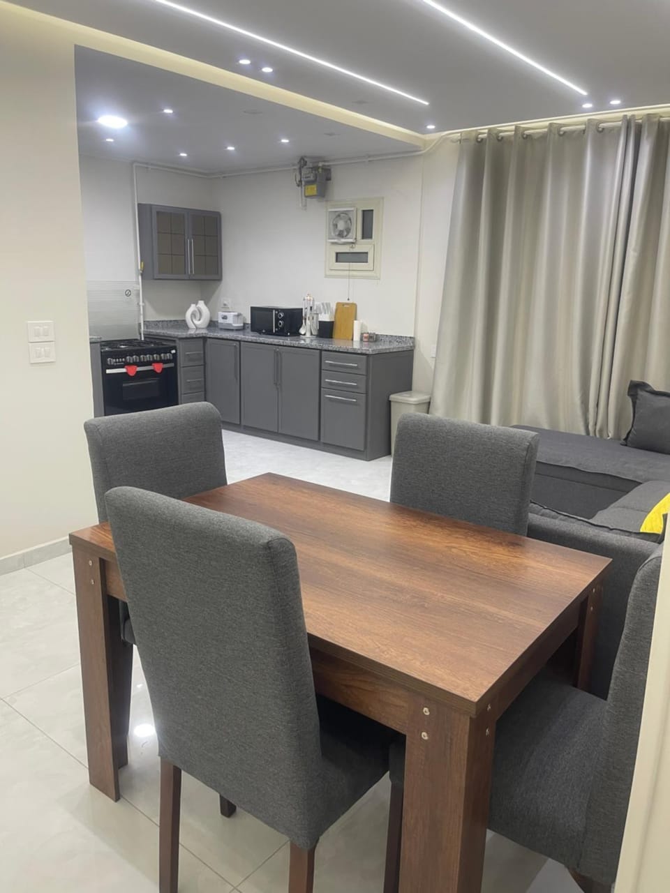 Kitchen or kitchenette, Living room, Seating area, Dining area