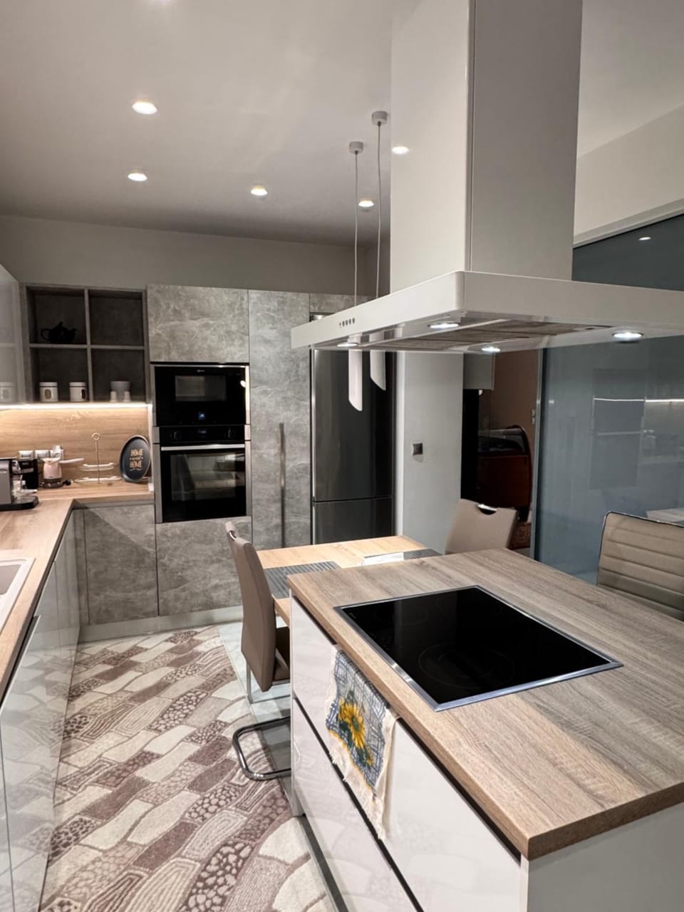 Kitchen or kitchenette, dishwasher, oven, stove