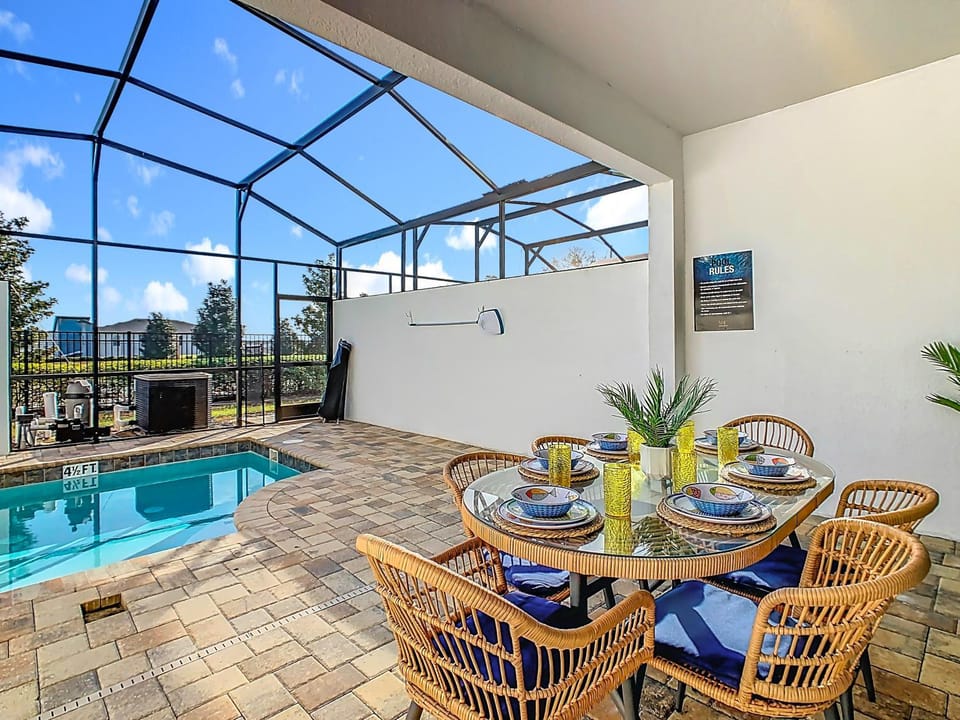 Patio, Day, Dining area, Pool view, Swimming pool
