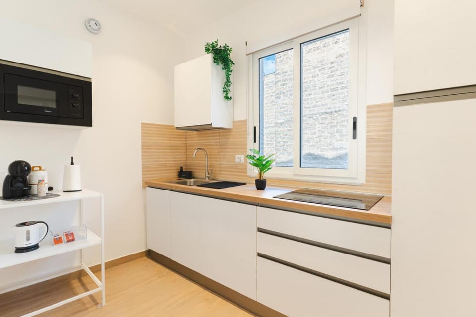 Kitchen or kitchenette, stove
