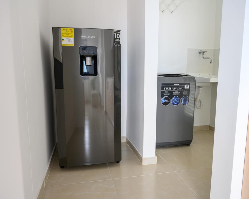 Kitchen or kitchenette, washing machine