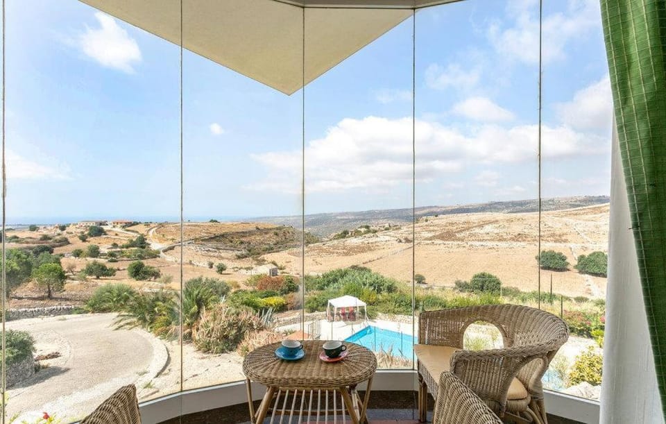 Patio, Nearby landmark, Day, Natural landscape, View (from property/room), Balcony/Terrace, Living room, Seating area, Dining area, Mountain view, Pool view, Sea view, Swimming pool