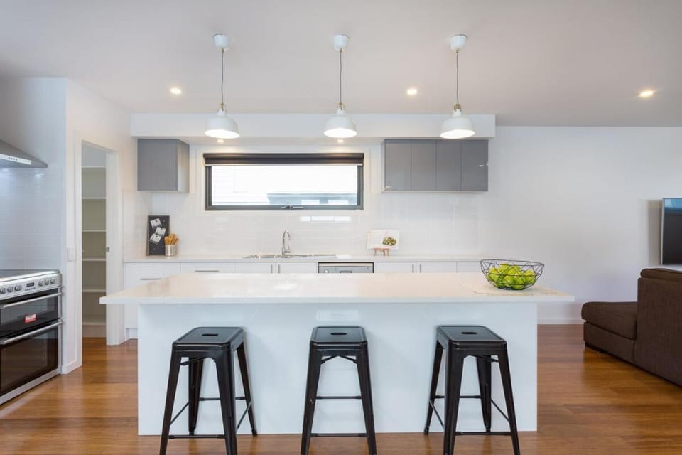 Kitchen or kitchenette, dishwasher, oven, stove, toaster