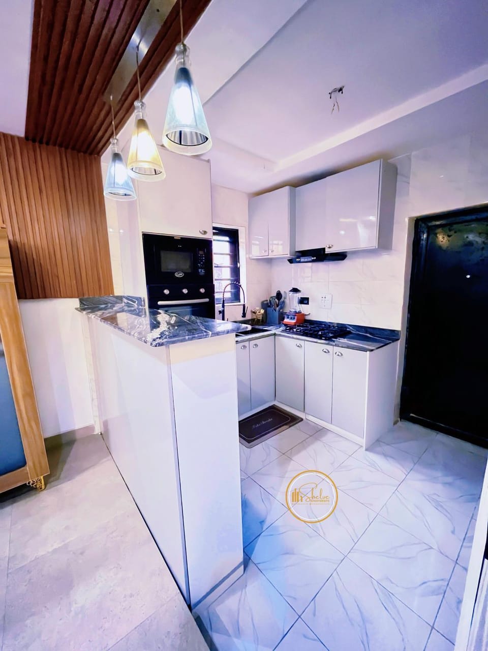 Kitchen or kitchenette, dishwasher, microwave, oven