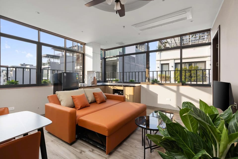 Communal lounge/ TV room, Day, TV and multimedia, Seating area, air conditioner