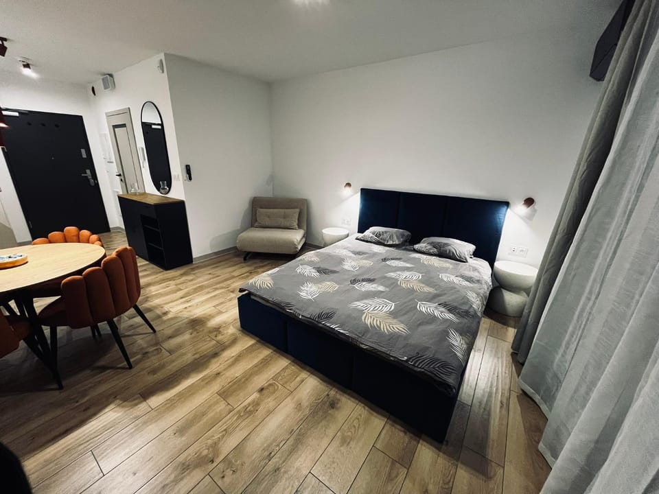 Bed, Living room, Seating area, Bedroom