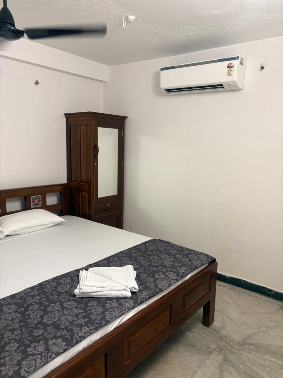 Bed, Bedroom, towels, wardrobe, air conditioner