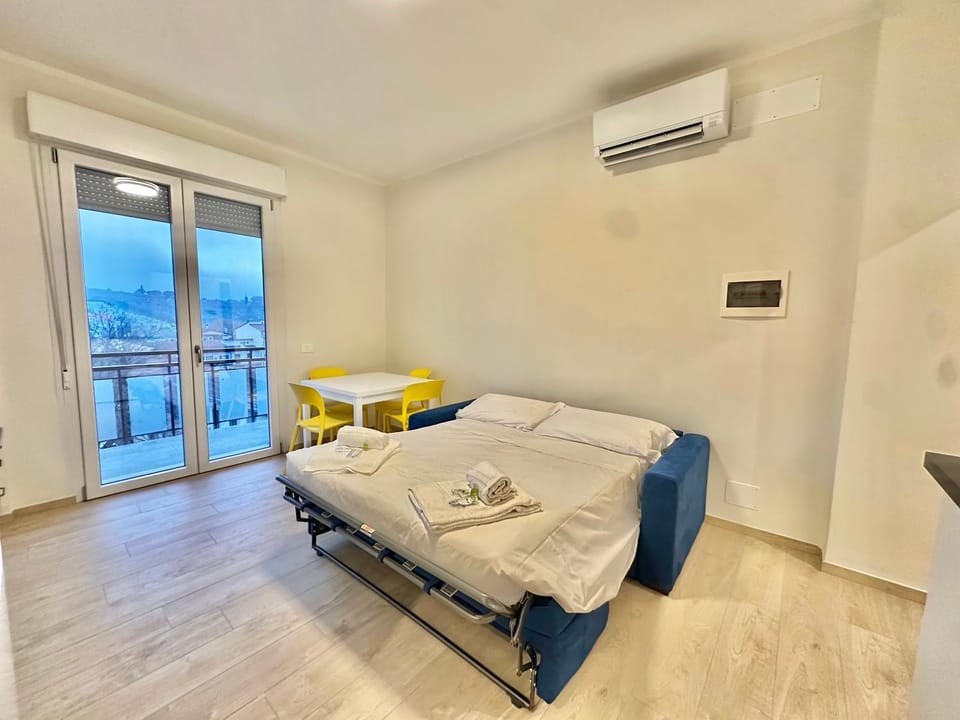 Bed, Living room, towels, air conditioner