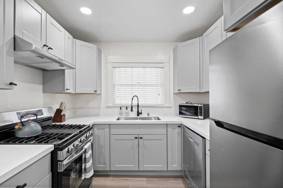 Kitchen or kitchenette, dishwasher, oven, stove, toaster