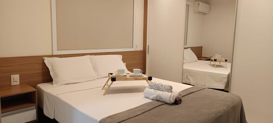 Bed, Bedroom, locker, towels, air conditioner