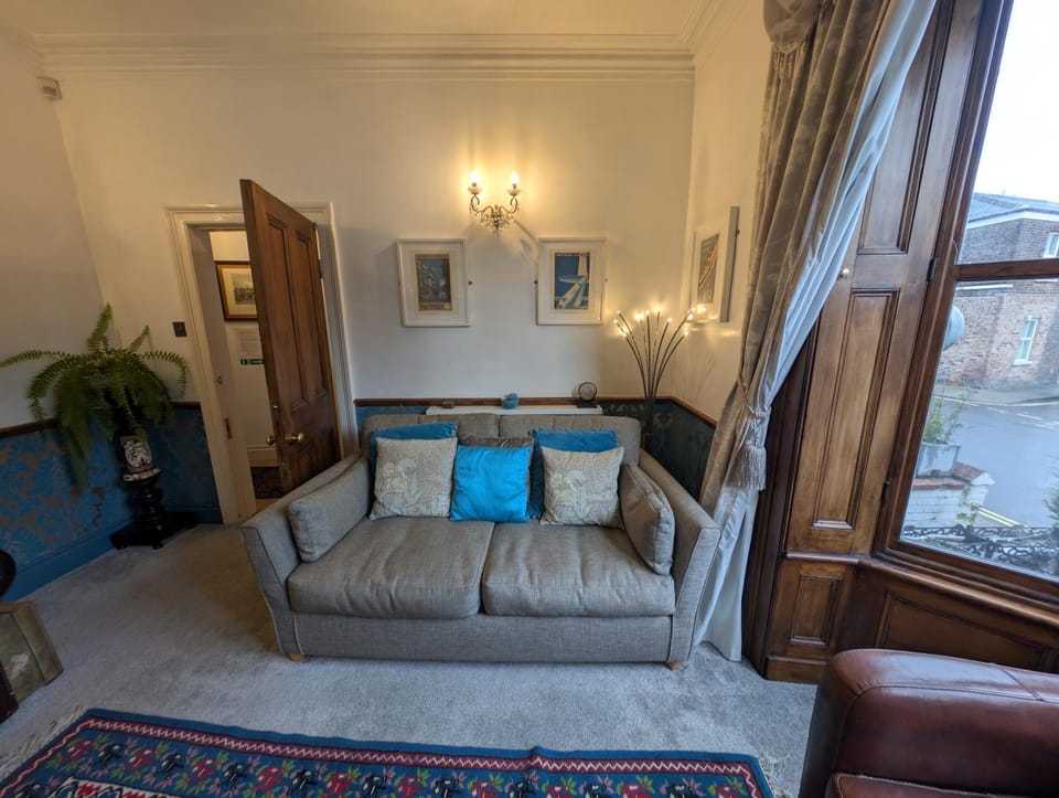 Bed, Living room, Seating area