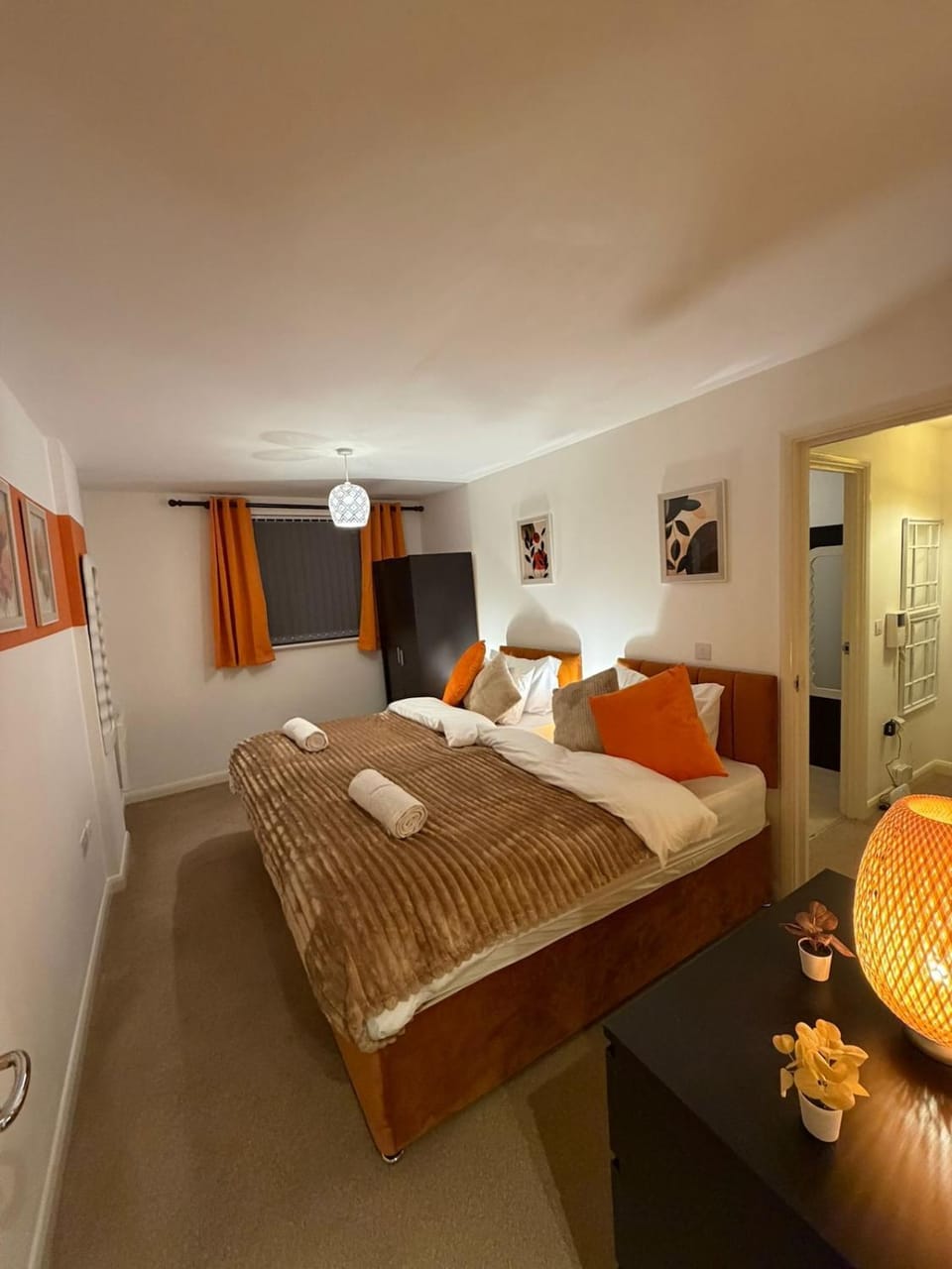 Bed, Bedroom, hair dryier, towels, wardrobe