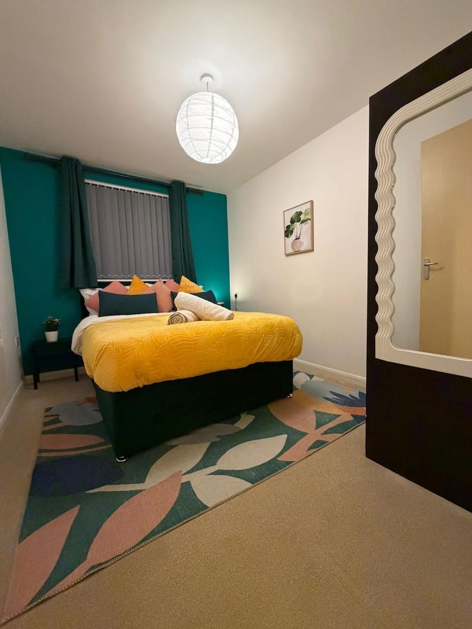 Bed, Photo of the whole room, Decorative detail, Bedroom, hair dryier, towels, wardrobe