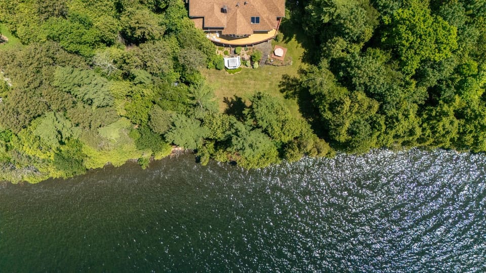 Rustic-modern Lake House in Milton Near Burlington and Eagle Mountain House in Georgia