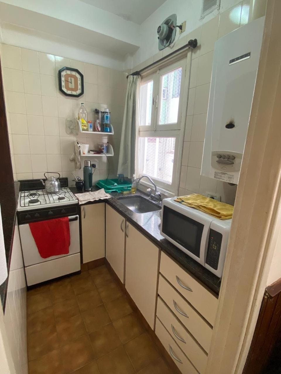 Kitchen or kitchenette, microwave