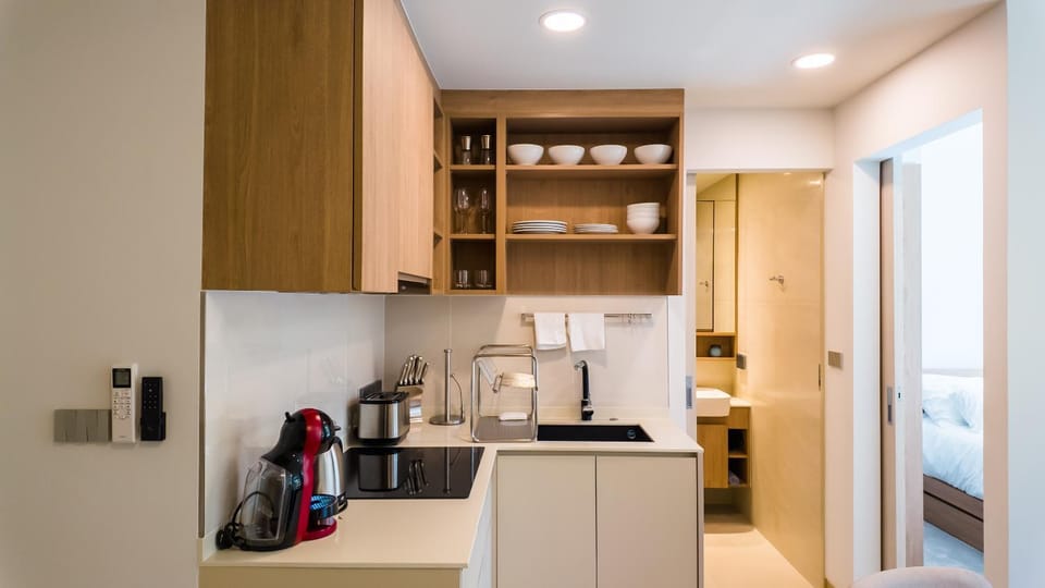Kitchen or kitchenette, stove, toaster