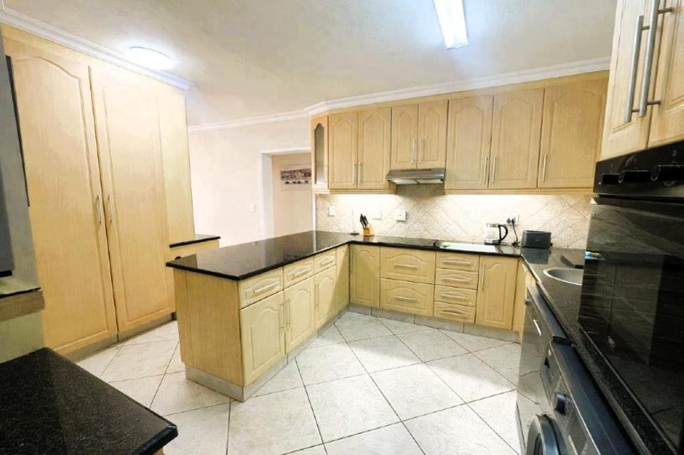 Kitchen or kitchenette, dishwasher, stove