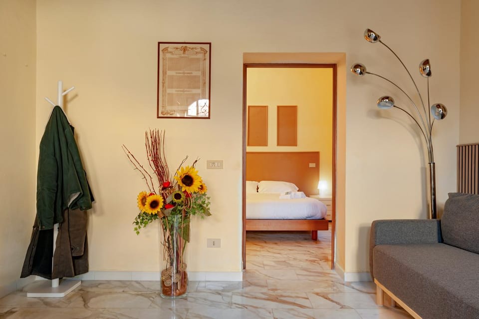 Bed, Living room, Seating area, towels, air conditioner