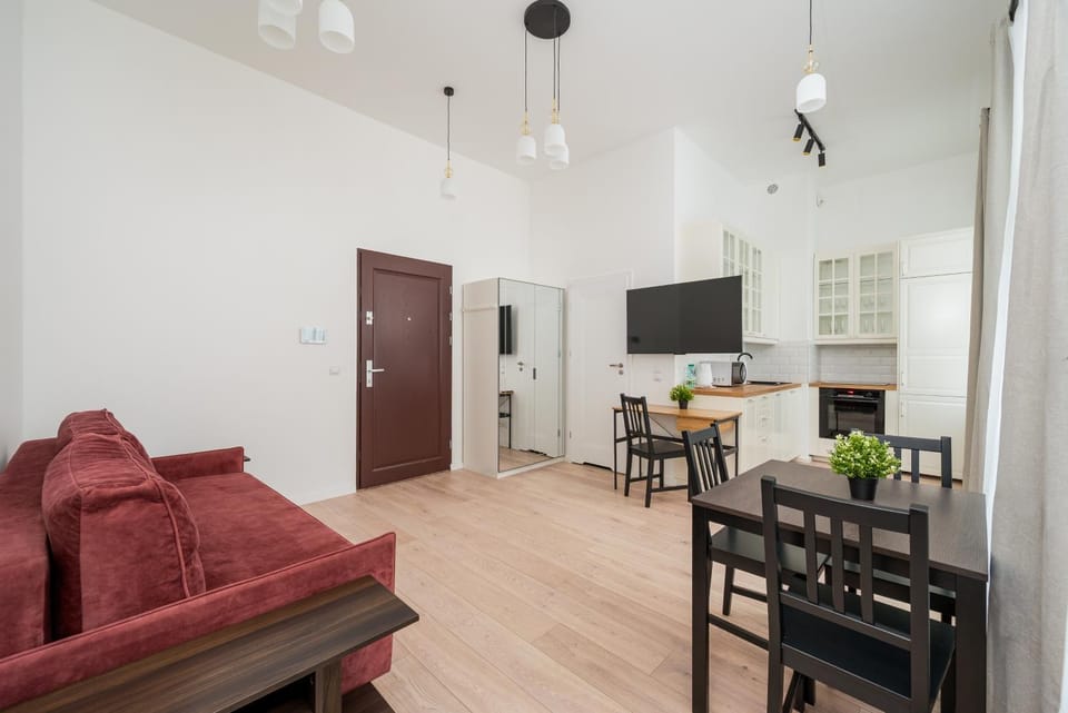 TV and multimedia, Kitchen or kitchenette, Living room, Seating area, Dining area, oven, stove, wardrobe