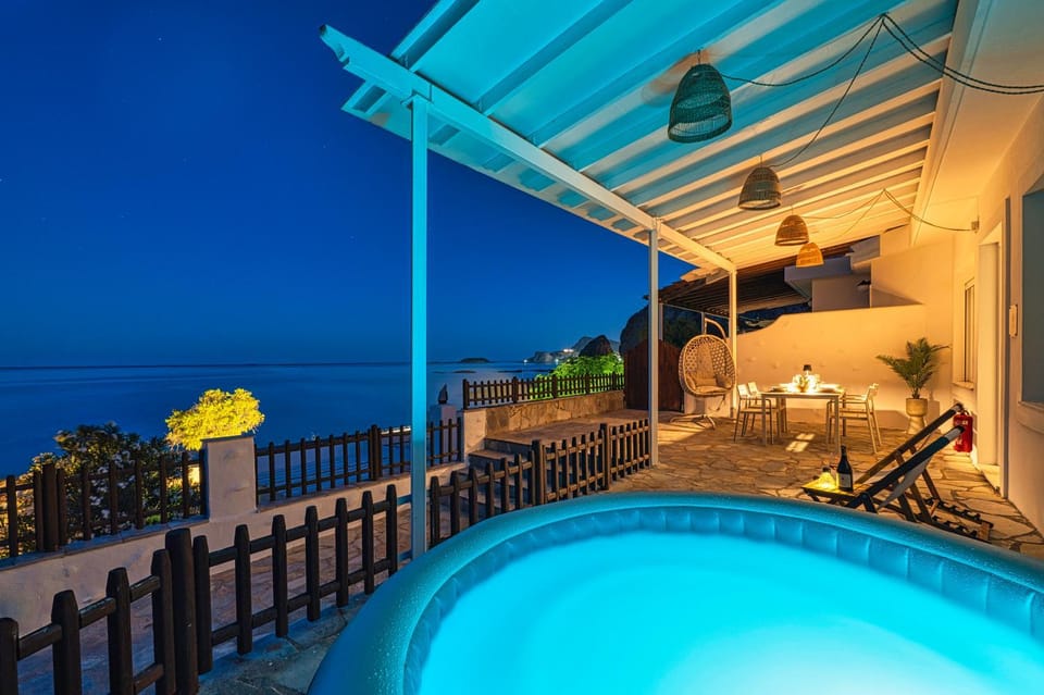 Property building, Night, Summer, Hot Tub, View (from property/room), Dining area, Sea view, sunbed