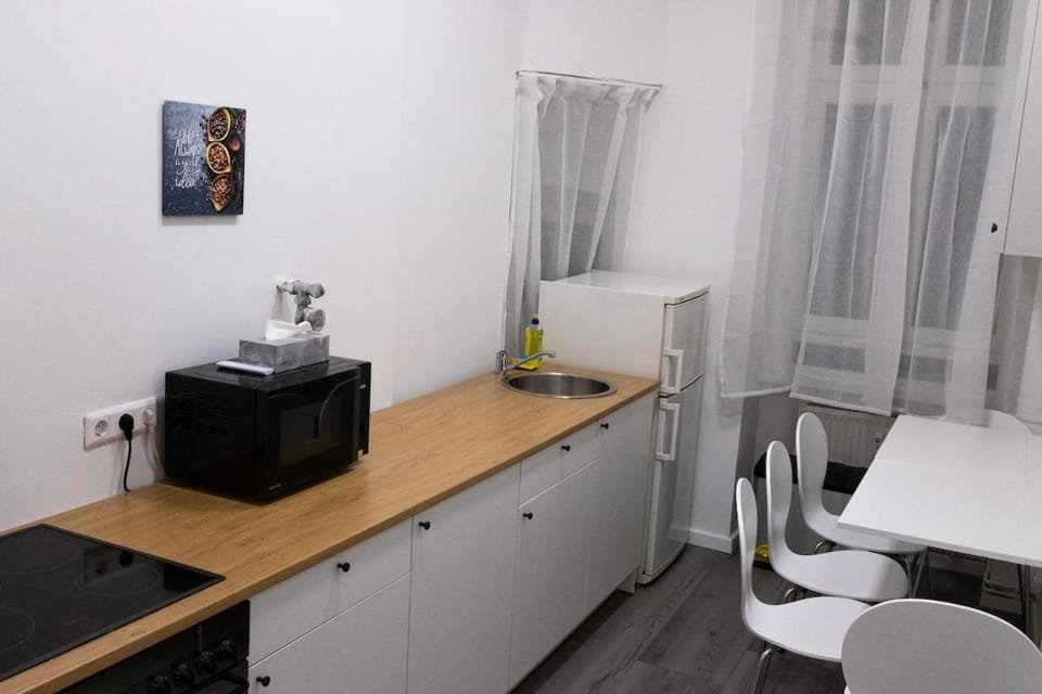 Kitchen or kitchenette, stove, kitchen