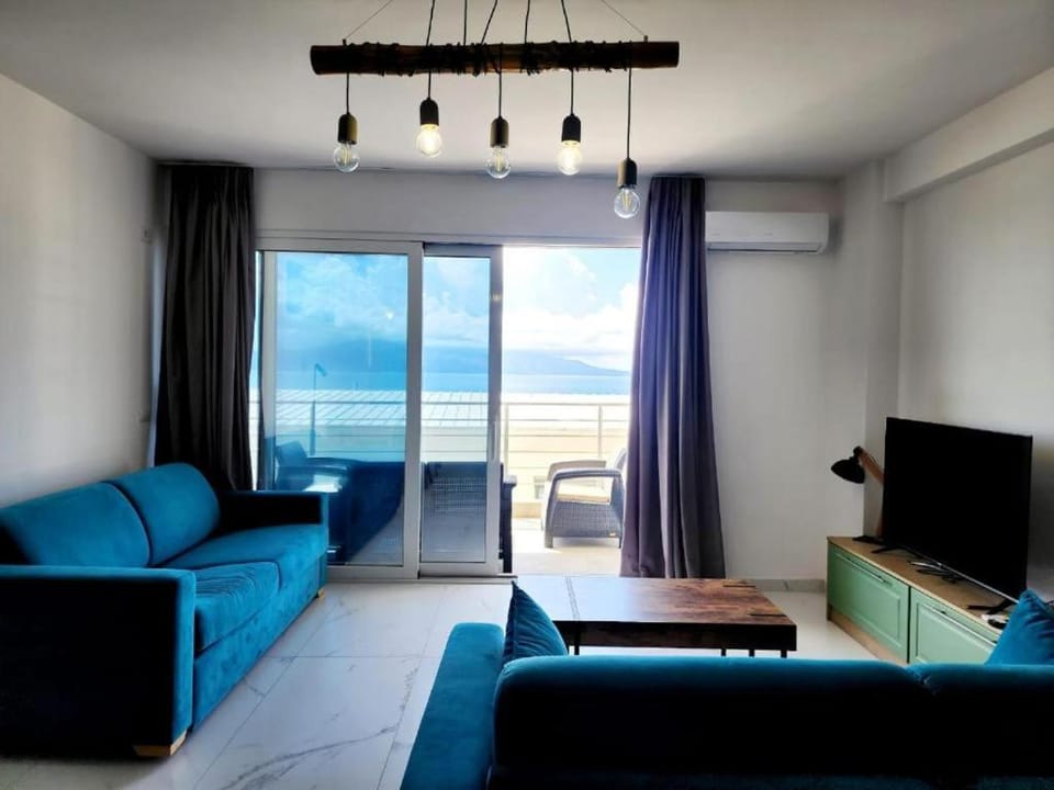 TV and multimedia, Living room, Seating area, Sea view, air conditioner