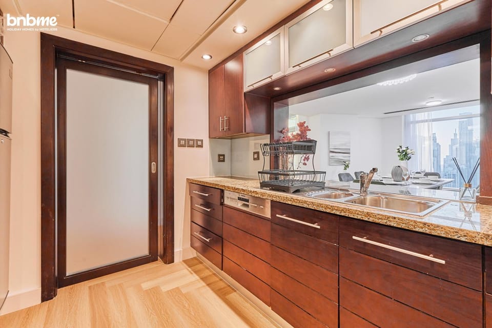 Kitchen or kitchenette, dishwasher, oven, stove, toaster